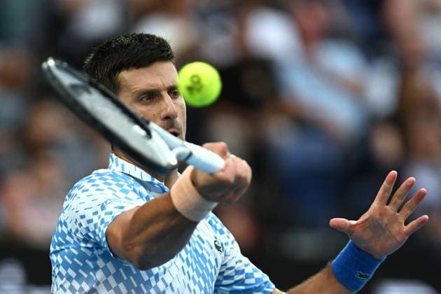TENNIS AUSTRALIAN OPEN, Novak Djokovic of Serbia in action during his match against Grigor Dimitrov of Bulgaria during the 2023 Australian Open tennis tournament at Melbourne Park in Melbourne, Friday, January 1, 2021. ( NO ARCHIVING, EDITORIAL USE ONLY, NO USE IN BOOKS WITHOUT CONSENT MELBOURNE VICTORIA AUSTRALIA  Copyright: xLUKASxCOCHx 20230121001755023664