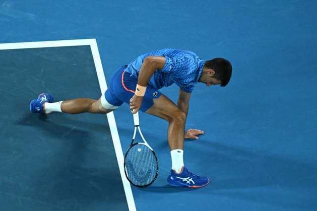 TENNIS AUSTRALIAN OPEN, Novak Djokovic of Serbia in action during his match against Grigor Dimitrov of Bulgaria during the 2023 Australian Open tennis tournament at Melbourne Park in Melbourne, Friday, January 1, 2021. ( NO ARCHIVING, EDITORIAL USE ONLY, NO USE IN BOOKS WITHOUT CONSENT MELBOURNE VICTORIA AUSTRALIA  Copyright: xLUKASxCOCHx 20230121001755029525