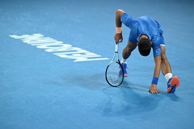 TENNIS AUSTRALIAN OPEN, Novak Djokovic of Serbia stretches during in his match against Grigor Dimitrov of Bulgaria during the 2023 Australian Open tennis tournament at Melbourne Park in Melbourne, Saturday, January 21, 2023. ( NO ARCHIVING, EDITORIAL USE ONLY, NO USE IN BOOKS WITHOUT CONSENT MELBOURNE VICTORIA AUSTRALIA  Copyright: xLUKASxCOCHx 20230121001755046904