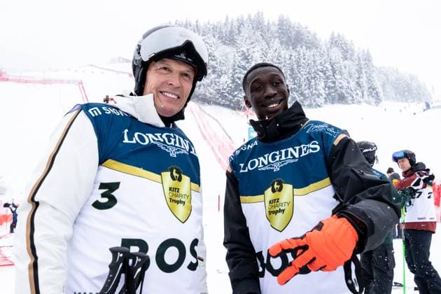 ALPINE SKIING - FIS WC Kitzbuehel KITZBUEHEL,AUSTRIA,21.JAN.23 - ALPINE SKIING - FIS World Cup, Hahnenkamm-race, side event, Kitz Charity Trophy. Image shows Daniel Grieder (Boss 1) and Lame Khaby (Boss 1).  GEPAxpictures xMaticxKlansek