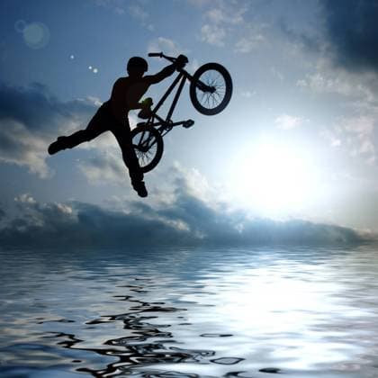 silhouette of boy with bicycle jumping in air silhouette of boy with bicycle jumping in air (License=RF) 3399281 Copyright: xZoonar.com IaroslavxDanylchenkox 3399281