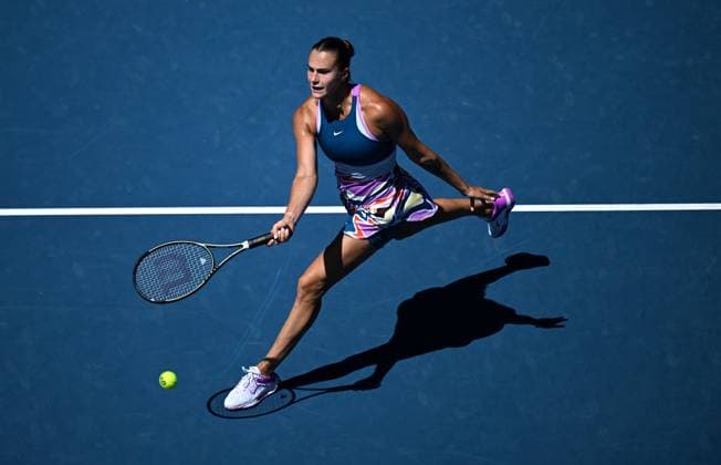 TENNIS AUSTRALIAN OPEN, Aryna Sabalenka of Belarus returns to Belinda Bencic of Switzerland during their fourth round match at 2023 Australian Open tennis championship at Melbourne Park in Melbourne, Monday, January 23, 2023. ( NO ARCHIVING, EDITORIAL USE ONLY, NO USE IN BOOKS WITHOUT CONSENT MELBOURNE VICTORIA AUSTRALIA  Copyright: xJAMESxROSSx 20230123001755743278