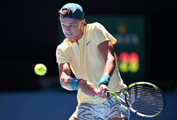 TENNIS AUSTRALIAN OPEN, Holger Rune of Denmark returns during his fourth round match against Andrey Rublev of Russia at 2023 Australian Open tennis championship at Melbourne Park in Melbourne, Monday, January 23, 2023. ( NO ARCHIVING, EDITORIAL USE ONLY, NO USE IN BOOKS WITHOUT CONSENT MELBOURNE VICTORIA AUSTRALIA  Copyright: xJAMESxROSSx 20230123001755783889