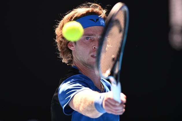 Sport Bilder des Tages TENNIS AUSTRALIAN OPEN, Andrey Rublev of Russia returns to Holger Rune of Denmark during their fourth round match at 2023 Australian Open tennis championship at Melbourne Park in Melbourne, Monday, January 23. ( NO ARCHIVING, EDITORIAL USE ONLY, NO USE IN BOOKS WITHOUT CONSENT MELBOURNE VICTORIA AUSTRALIA  Copyright: xJAMESxROSSx 20230123001755786084