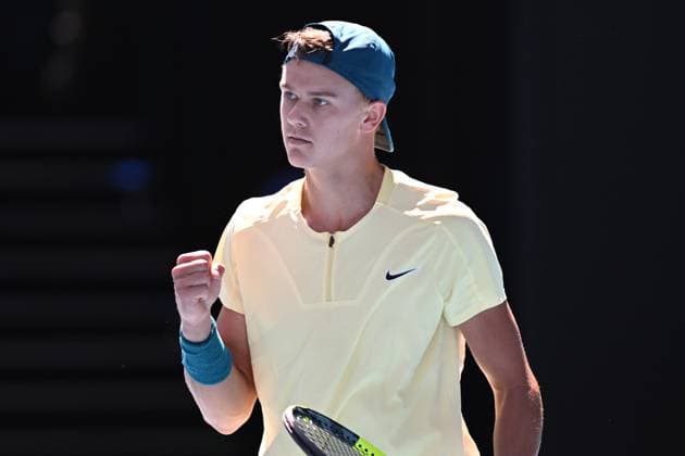 TENNIS AUSTRALIAN OPEN, Holger Rune of Denmark wins a point against Andrey Rublev of Russia during their fourth round match at 2023 Australian Open tennis championship at Melbourne Park in Melbourne, Monday, January 23. ( NO ARCHIVING, EDITORIAL USE ONLY, NO USE IN BOOKS WITHOUT CONSENT MELBOURNE VICTORIA AUSTRALIA  Copyright: xJAMESxROSSx 20230123001755788994
