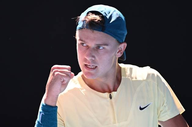 TENNIS AUSTRALIAN OPEN, Holger Rune of Denmark wins a point against Andrey Rublev of Russia during their fourth round match at 2023 Australian Open tennis championship at Melbourne Park in Melbourne, Monday, January 23. ( NO ARCHIVING, EDITORIAL USE ONLY, NO USE IN BOOKS WITHOUT CONSENT MELBOURNE VICTORIA AUSTRALIA  Copyright: xJAMESxROSSx 20230123001755789410