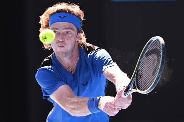 TENNIS AUSTRALIAN OPEN, Andrey Rublev of Russia returns to Holger Rune of Denmark during their fourth round match at 2023 Australian Open tennis championship at Melbourne Park in Melbourne, Monday, January 23. ( NO ARCHIVING, EDITORIAL USE ONLY, NO USE IN BOOKS WITHOUT CONSENT MELBOURNE VICTORIA AUSTRALIA  Copyright: xJAMESxROSSx 20230123001755793830