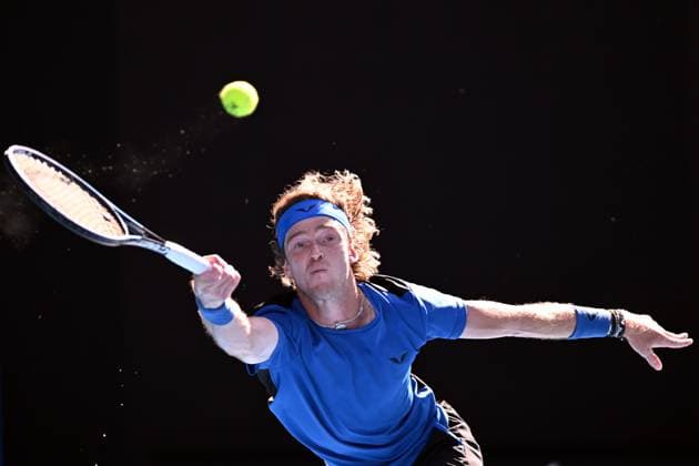 TENNIS AUSTRALIAN OPEN, Andrey Rublev of Russia returns to Holger Rune of Denmark during their fourth round match at 2023 Australian Open tennis championship at Melbourne Park in Melbourne, Monday, January 23. ( NO ARCHIVING, EDITORIAL USE ONLY, NO USE IN BOOKS WITHOUT CONSENT MELBOURNE VICTORIA AUSTRALIA  Copyright: xJAMESxROSSx 20230123001755798423