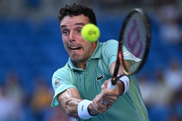 TENNIS AUSTRALIAN OPEN, Roberto Bautista Agut of Spain in action during his match against Tommy Paul of the United States during the 2023 Australian Open tennis tournament at Melbourne Park in Melbourne, Monday, January 23. ( NO ARCHIVING, EDITORIAL USE ONLY, NO USE IN BOOKS WITHOUT CONSENT MELBOURNE VICTORIA AUSTRALIA  Copyright: xLUKASxCOCHx 20230123001755803695