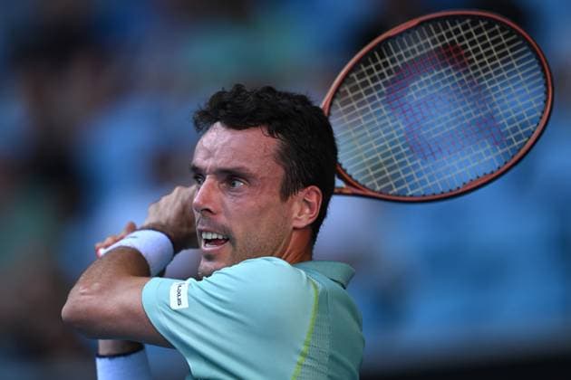 TENNIS AUSTRALIAN OPEN, Roberto Bautista Agut of Spain in action during his match against Tommy Paul of the United States during the 2023 Australian Open tennis tournament at Melbourne Park in Melbourne, Monday, January 23. ( NO ARCHIVING, EDITORIAL USE ONLY, NO USE IN BOOKS WITHOUT CONSENT MELBOURNE VICTORIA AUSTRALIA  Copyright: xLUKASxCOCHx 20230123001755803857
