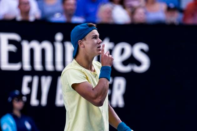 MELBOURNE, VIC - JANUARY 23: Holger Rune of Denmark asks the umpire to remind the crowd to be quite during Round 4 of the 2023 Australian Open on January 23 2023, at Melbourne Park in Melbourne, Australia. (Photo by Jason Heidrich Icon Sportswire) TENNIS: JAN 23 Australian Open Icon230123158