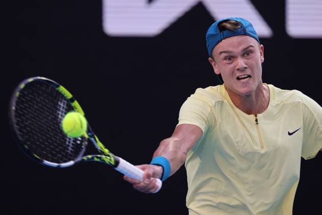 Holger Rune of Denmark in action against Andrey Rublev, Day 8 at the Australian Open Tennis 2023 at Rod Laver Arena, Melbourne, Australia on 23 January 2023. Copyright: xPeterxDovganx 34781846