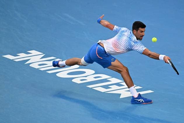 TENNIS AUSTRALIAN OPEN, Novak Djokovic of Serbia in action during his match against Alex de Minaur of Australia during the 2023 Australian Open tennis tournament at Melbourne Park in Melbourne, Monday, January 23, 2019. ( NO ARCHIVING, EDITORIAL USE ONLY, NO USE IN BOOKS WITHOUT CONSENT MELBOURNE VICTORIA AUSTRALIA  Copyright: xJOELxCARRETTx 20230123001755812977