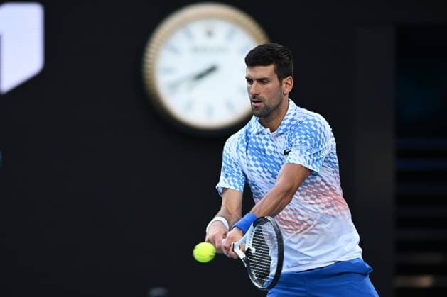 TENNIS AUSTRALIAN OPEN, Novak Djokovic of Serbia in action during his match against Alex de Minaur of Australia during the 2023 Australian Open tennis tournament at Melbourne Park in Melbourne, Monday, January 23, 2023. ( NO ARCHIVING, EDITORIAL USE ONLY, NO USE IN BOOKS WITHOUT CONSENT MELBOURNE VICTORIA AUSTRALIA  Copyright: xJOELxCARRETTx 20230123001755813324