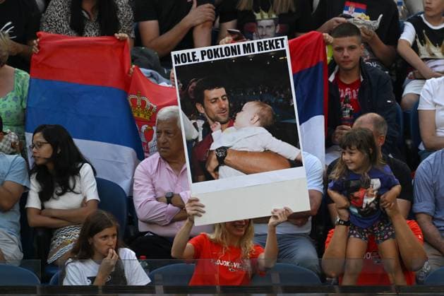TENNIS AUSTRALIAN OPEN, Fans holding Serbian flags and a placard of Novak Djokovic of Serbia in during his match against Alex de Minaur of Australia during the 2023 Australian Open tennis tournament at Melbourne Park in Melbourne, Monday, January 23, 2023. ( NO ARCHIVING, EDITORIAL USE ONLY, NO USE IN BOOKS WITHOUT CONSENT MELBOURNE VICTORIA AUSTRALIA  Copyright: xJOELxCARRETTx 20230123001755819450