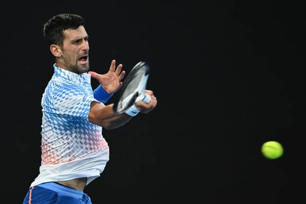 TENNIS AUSTRALIAN OPEN, Novak Djokovic of Serbia in action during his match against Alex de Minaur of Australia during the 2023 Australian Open tennis tournament at Melbourne Park in Melbourne, Monday, January 23, 2023. ( NO ARCHIVING, EDITORIAL USE ONLY, NO USE IN BOOKS WITHOUT CONSENT MELBOURNE VICTORIA AUSTRALIA  Copyright: xJOELxCARRETTx 20230123001755822270
