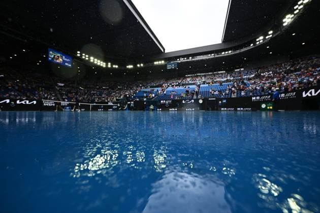 TENNIS AUSTRALIAN OPEN, Rain delays play the Elena Rybakina of Kazakhstan Quarterfinal match against Jelena Ostapenko of Latvia at the 2023 Australian Open tennis tournament at Melbourne Park in Melbourne, Tuesday, January 24, 2023. ( NO ARCHIVING, EDITORIAL USE ONLY, NO USE IN BOOKS WITHOUT CONSENT MELBOURNE VICTORIA AUSTRALIA  Copyright: xJOELxCARRETTx 20230124001756024401