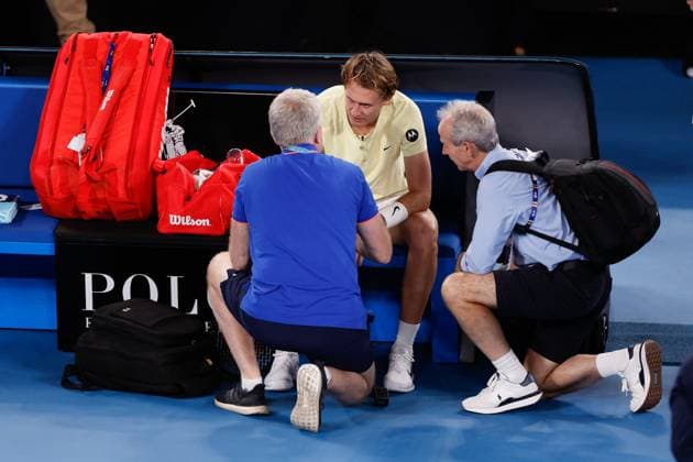 January 24, 2023, Melbourne, Victoria, Australia: MELBOURNE, AUSTRALIA - JANUARY 24: Sebastian Korda of USA receives treatement for his wrist whilst playing Karen Khachanov of Russia in quarter final action on day 9 of the 2023 Australian Open at Melbourne Park on January 24, 2023 in Melbourne, Australia. Melbourne Australia - ZUMAp121 20230124_zsp_p121_032 Copyright: xChrisxPutnamx