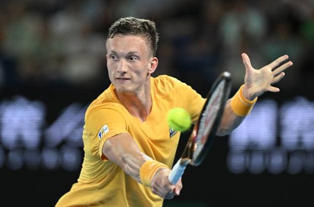 TENNIS AUSTRALIAN OPEN, Jiri Lehecka of Czech Republic returns to Stefanos Tsitsipas of Greece during their quarter final match at the 2023 Australian Open tennis championship at Melbourne Park in Melbourne, Tuesday, January 24, 2023. ( NO ARCHIVING, EDITORIAL USE ONLY, NO USE IN BOOKS WITHOUT CONSENT MELBOURNE VICTORIA AUSTRALIA  Copyright: xLUKASxCOCHx 20230124001756109313