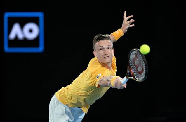 Sport Bilder des Tages TENNIS AUSTRALIAN OPEN, Jiri Lehecka of Czech Republic returns to Stefanos Tsitsipas of Greece during their quarter final match at the 2023 Australian Open tennis championship at Melbourne Park in Melbourne, Tuesday, January 24, 2023. ( NO ARCHIVING, EDITORIAL USE ONLY, NO USE IN BOOKS WITHOUT CONSENT MELBOURNE VICTORIA AUSTRALIA  Copyright: xLUKASxCOCHx 20230124001756110336