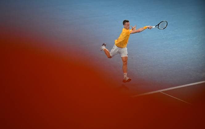 TENNIS AUSTRALIAN OPEN, Jiri Lehecka of Czech Republic returns to Stefanos Tsitsipas of Greece during their quarter final match at the 2023 Australian Open tennis championship at Melbourne Park in Melbourne, Tuesday, January 24, 2023. ( NO ARCHIVING, EDITORIAL USE ONLY, NO USE IN BOOKS WITHOUT CONSENT MELBOURNE VICTORIA AUSTRALIA  Copyright: xLUKASxCOCHx 20230124001756115022