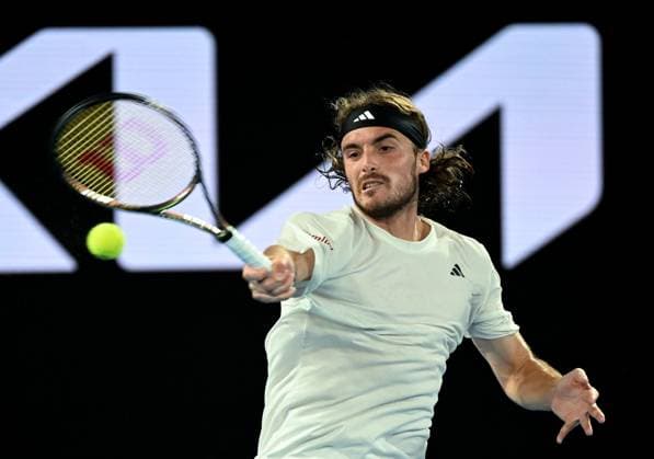 (230124) -- MELBOURNE, Jan. 24, 2023 -- Stefanos Tsitsipas of Greece hits a return during the men s singles quarterfinal against Jiri Lehecka of the Czech Republic at Australian Open at Melbourne Park in Melbourne, Australia, Jan. 24, 2023. ) (SP)AUSTRALIA-MELBOURNE-TENNIS-AUSTRALIAN OPEN-QUARTERFINALS GuoxLei 