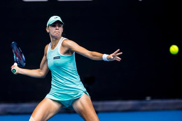 MELBOURNE, VIC - JANUARY 25: Magda Linette of Poland in action during the Quarterfinals of the 2023 Australian Open on January 25 2023, at Melbourne Park in Melbourne, Australia. (Photo by Jason Heidrich Icon Sportswire) TENNIS: JAN 25 Australian Open Icon230125024