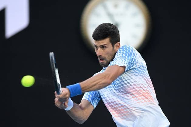 TENNIS AUSTRALIAN OPEN, Novak Djokovic of Serbia in action during his Quarterfinal match agains Andrey Rublev at the 2023 Australian Open tennis tournament at Melbourne Park in Melbourne, Wednesday, January 25, 2023. ( NO ARCHIVING, EDITORIAL USE ONLY, NO USE IN BOOKS WITHOUT CONSENT MELBOURNE VICTORIA AUSTRALIA  Copyright: xJAMESxROSSx 20230125001756406778