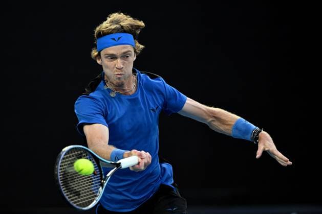 TENNIS AUSTRALIAN OPEN, Andrey Rublev in action during his Quarterfinal match against Novak Djokovic of Serbia at the 2023 Australian Open tennis tournament at Melbourne Park in Melbourne, Wednesday, January 25, 2023. ( NO ARCHIVING, EDITORIAL USE ONLY, NO USE IN BOOKS WITHOUT CONSENT MELBOURNE VICTORIA AUSTRALIA  Copyright: xLUKASxCOCHx 20230125001756407920