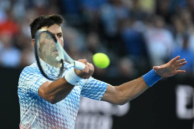 TENNIS AUSTRALIAN OPEN, Novak Djokovic of Serbia in action during his Quarterfinal match agains Andrey Rublev at the 2023 Australian Open tennis tournament at Melbourne Park in Melbourne, Wednesday, January 25, 2023. ( NO ARCHIVING, EDITORIAL USE ONLY, NO USE IN BOOKS WITHOUT CONSENT MELBOURNE VICTORIA AUSTRALIA  Copyright: xLUKASxCOCHx 20230125001756410949