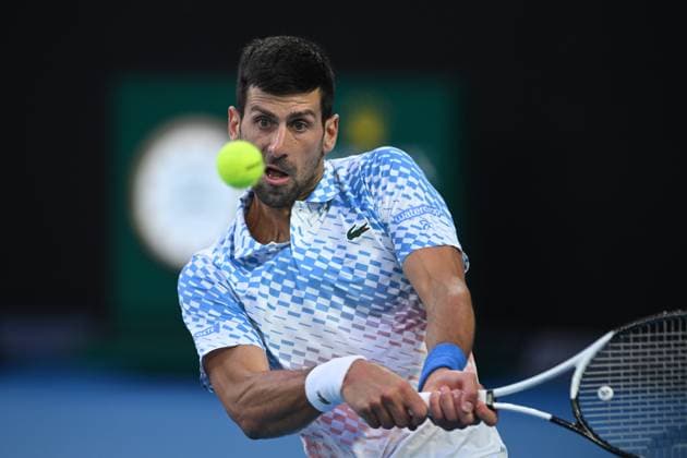 TENNIS AUSTRALIAN OPEN, Novak Djokovic of Serbia in action during his Quarterfinal match agains Andrey Rublev at the 2023 Australian Open tennis tournament at Melbourne Park in Melbourne, Wednesday, January 25, 2023. ( NO ARCHIVING, EDITORIAL USE ONLY, NO USE IN BOOKS WITHOUT CONSENT MELBOURNE VICTORIA AUSTRALIA  Copyright: xJAMESxROSSx 20230125001756412395