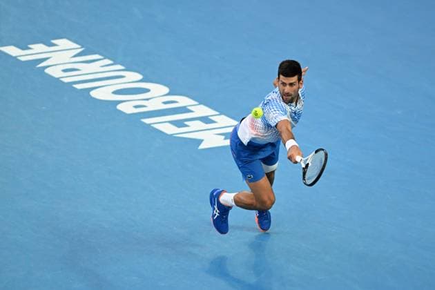 TENNIS AUSTRALIAN OPEN, Novak Djokovic of Serbia in action during his Quarterfinal match agains Andrey Rublev at the 2023 Australian Open tennis tournament at Melbourne Park in Melbourne, Wednesday, January 25, 2023. ( NO ARCHIVING, EDITORIAL USE ONLY, NO USE IN BOOKS WITHOUT CONSENT MELBOURNE VICTORIA AUSTRALIA  Copyright: xLUKASxCOCHx 20230125001756413884