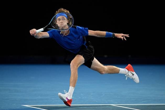 TENNIS AUSTRALIAN OPEN, Andrey Rublev in action during his Quarterfinal match against Novak Djokovic of Serbia at the 2023 Australian Open tennis tournament at Melbourne Park in Melbourne, Wednesday, January 25, 2023. ( NO ARCHIVING, EDITORIAL USE ONLY, NO USE IN BOOKS WITHOUT CONSENT MELBOURNE VICTORIA AUSTRALIA  Copyright: xJAMESxROSSx 20230125001756417786