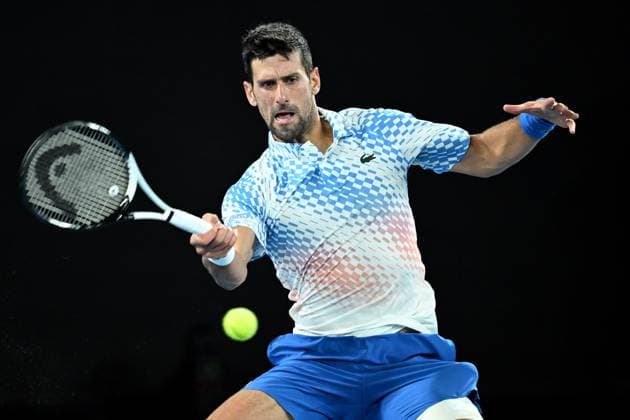 TENNIS AUSTRALIAN OPEN, Novak Djokovic of Serbia in action during his Quarterfinal match agains Andrey Rublev at the 2023 Australian Open tennis tournament at Melbourne Park in Melbourne, Wednesday, January 25, 2023. ( NO ARCHIVING, EDITORIAL USE ONLY, NO USE IN BOOKS WITHOUT CONSENT MELBOURNE VICTORIA AUSTRALIA  Copyright: xJAMESxROSSx 20230125001756423582