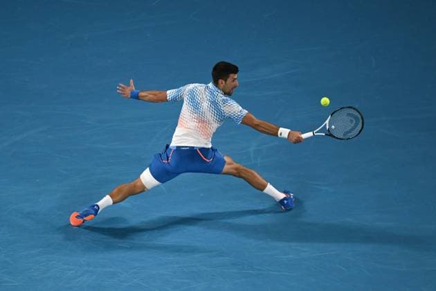 TENNIS AUSTRALIAN OPEN, Novak Djokovic of Serbia in action during his Quarterfinal match agains Andrey Rublev at the 2023 Australian Open tennis tournament at Melbourne Park in Melbourne, Wednesday, January 25, 2023. ( NO ARCHIVING, EDITORIAL USE ONLY, NO USE IN BOOKS WITHOUT CONSENT MELBOURNE VICTORIA AUSTRALIA  Copyright: xLUKASxCOCHx 20230125001756423896