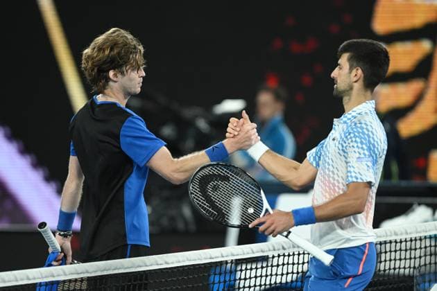 TENNIS AUSTRALIAN OPEN, Novak Djokovic of Serbia shakes hands after celebrating match point during his Quarterfinal match against Andrey Rublev at the 2023 Australian Open tennis tournament at Melbourne Park in Melbourne, Wednesday, January 25, 2023. ( NO ARCHIVING, EDITORIAL USE ONLY, NO USE IN BOOKS WITHOUT CONSENT MELBOURNE VICTORIA AUSTRALIA  Copyright: xJAMESxROSSx 20230125001756431703