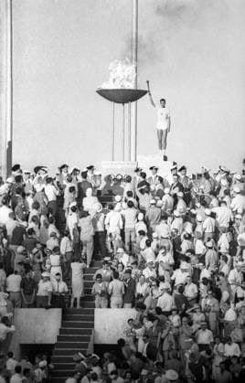 Rome, Italy. August 25, 1960. Italian track and field athlete Gian Carlo Peris lights the Olympic Flame at the Stadio Olimpico stadium during the grand opening ceremony of the 1960 Summer Olympics. Viktor Koshevoy TASS  9310876