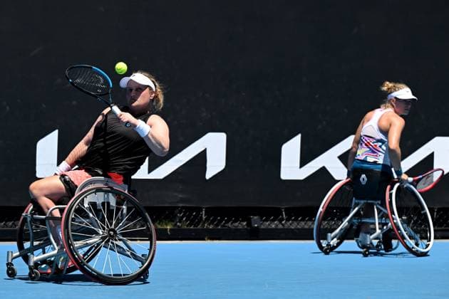 TENNIS AUSTRALIAN OPEN, Aniek Van Koot of the Netherlands plays a shot during her Women?s Wheelchair Doubles final with Diede De Groot, against Yui Kamiji of Japan and Shenzhen Zhu of China at the 2023 Australian Open tennis championship at Melbourne Park in Melbourne, Thursday, January 26, 2023. ( NO ARCHIVING, EDITORIAL USE ONLY, NO USE IN BOOKS WITHOUT CONSENT MELBOURNE VICTORIA AUSTRALIA  Copyright: xLUKASxCOCHx 20230127001757012692