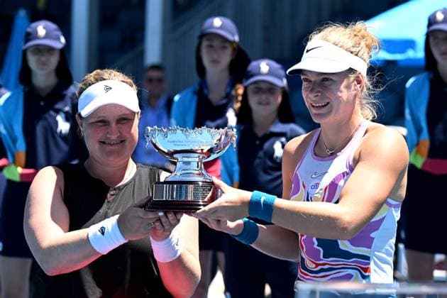 TENNIS AUSTRALIAN OPEN, Aniek Van Koot (left) and Diede De Groot of the Netherlands raise the trophy after winning their Women?s Wheelchair Doubles final against Yui Kamiji of Japan and Shenzhen Zhu of China at the 2023 Australian Open tennis championship at Melbourne Park in Melbourne, Friday, January 27, 2023. ( NO ARCHIVING, EDITORIAL USE ONLY, NO USE IN BOOKS WITHOUT CONSENT MELBOURNE VICTORIA AUSTRALIA  Copyright: xLUKASxCOCHx 20230127001757014979