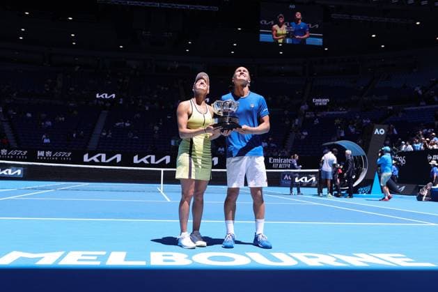 Luisa Stefani and Rafael Matos of Brazil lift the trophy after defeating Sania Mirza and Rohan Bopanna of India 7-6 6-2 in the Mixed Doubles Final match, Day 12 at the Australian Open Tennis 2023 at Rod Laver Arena, Melbourne, Australia on 27 January 2023. Copyright: xPeterxDovganx 34782436