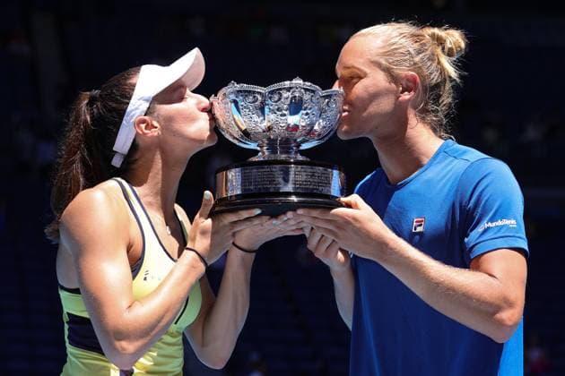 Luisa Stefani and Rafael Matos of Brazil kiss the trophy after defeating Sania Mirza and Rohan Bopanna of India 7-6 6-2 in the Mixed Doubles Final match, Day 12 at the Australian Open Tennis 2023 at Rod Laver Arena, Melbourne, Australia on 27 January 2023. Copyright: xPeterxDovganx 34782429