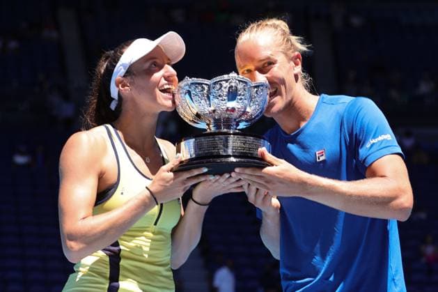 Luisa Stefani and Rafael Matos of Brazil bite the trophy after defeating Sania Mirza and Rohan Bopanna of India 7-6 6-2 in the Mixed Doubles Final match, Day 12 at the Australian Open Tennis 2023 at Rod Laver Arena, Melbourne, Australia on 27 January 2023. Copyright: xPeterxDovganx 34782431