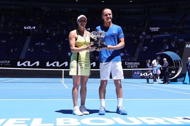 Luisa Stefani and Rafael Matos of Brazil lift the trophy after defeating Sania Mirza and Rohan Bopanna of India 7-6 6-2 in the Mixed Doubles Final match, Day 12 at the Australian Open Tennis 2023 at Rod Laver Arena, Melbourne, Australia on 27 January 2023. Copyright: xPeterxDovganx 34782435