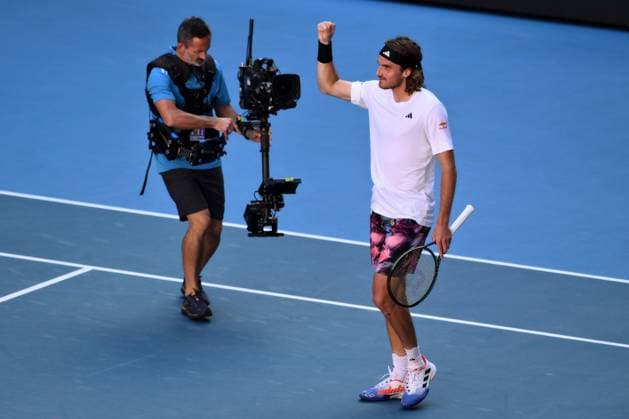 Mandatory Credit: Photo by James Gourley Shutterstock (13736332cy) Stefanos Tsitsipas celebrates victory in his semi-final match Australian Open, Day Twelve, Tennis, Melbourne Park, Melbourne, Australia - 27 Jan 2023 Australian Open, Day Twelve, Tennis, Melbourne Park, Melbourne, Australia - 27 Jan 2023  Copyright: xJamesxGourley Shutterstockx 13736332cy
