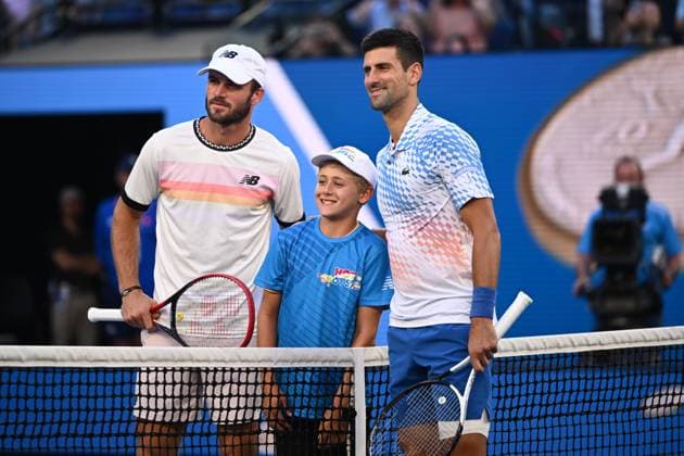 TENNIS AUSTRALIAN OPEN, Tommy Paul (L) of the United States and Novak Djokovic of Serbia pose for a photograph before the Men?s semi final match against at the 2023 Australian Open tennis championship at Melbourne Park in Melbourne, Thursday, January 26, 2023. ( NO ARCHIVING, EDITORIAL USE ONLY, NO USE IN BOOKS WITHOUT CONSENT MELBOURNE VICTORIA AUSTRALIA  Copyright: xJOELxCARRETTx 20230127001757093834