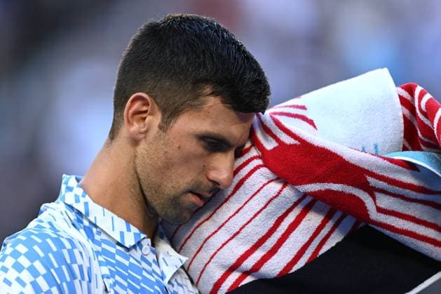TENNIS AUSTRALIAN OPEN, Novak Djokovic of Serbia after the first game during the Men?s semi final match against Tommy Paul of the United States at the 2023 Australian Open tennis championship at Melbourne Park in Melbourne, Thursday, January 26, 2023. ( NO ARCHIVING, EDITORIAL USE ONLY, NO USE IN BOOKS WITHOUT CONSENT MELBOURNE VICTORIA AUSTRALIA  Copyright: xJOELxCARRETTx 20230127001757096849