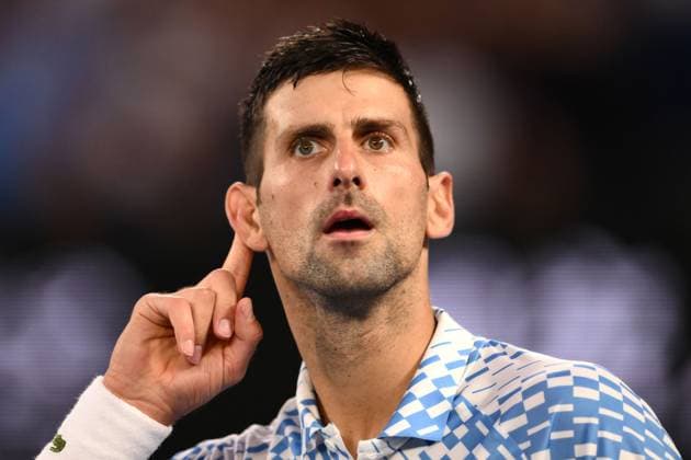 Mandatory Credit: Photo by James Gourley Shutterstock (13736332fa) Novak Djokovic of Serbia celebrates winning the set Australian Open, Day Twelve, Tennis, Melbourne Park, Melbourne, Australia - 27 Jan 2023 Australian Open, Day Twelve, Tennis, Melbourne Park, Melbourne, Australia - 27 Jan 2023  Copyright: xJamesxGourley Shutterstockx 13736332fa