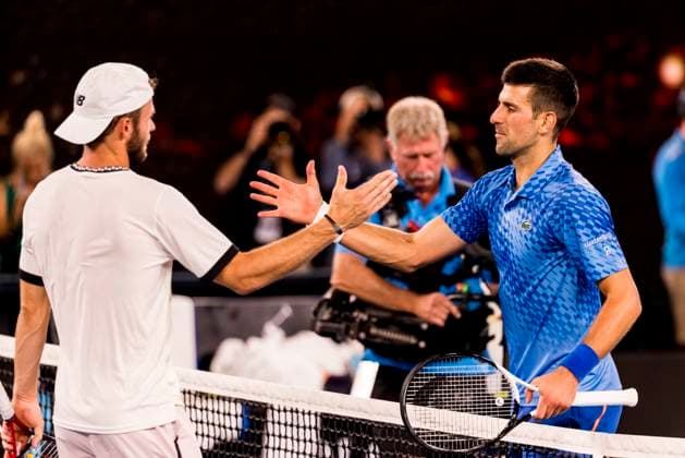 MELBOURNE, VIC - JANUARY 27: Novak Djokovic of Serbia meets his opponent Tommy Paul of the United States of America after winning his Semifinal match of the 2023 Australian Open on January 27 2023, at Melbourne Park in Melbourne, Australia. (Photo by Jason Heidrich Icon Sportswire) TENNIS: JAN 27 Australian Open Icon230127173