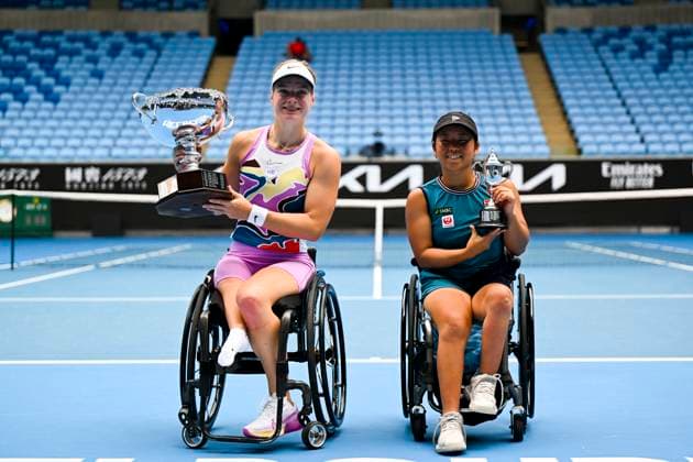 TENNIS AUSTRALIAN OPEN, Diede De Groot of the Netherlands (left) and Yui Kamiji of Japan pose for photographs with the rophies after their Women?s Wheelchair singles final match at the 2023 Australian Open tennis championship at Melbourne Park in Melbourne, Saturday, January 28, 2023. ( NO ARCHIVING, EDITORIAL USE ONLY, NO USE IN BOOKS WITHOUT CONSENT MELBOURNE VICTORIA AUSTRALIA  Copyright: xLUKASxCOCHx 20230128001757405878