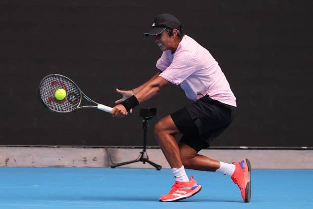 Learner Tien of USA in action against Alexander Blockx of Belgium in the Boys Final match, Day 13 at the Australian Open Tennis 2023 at Rod Laver Arena, Melbourne, Australia on 28 January 2023. Copyright: xPeterxDovganx 34782664